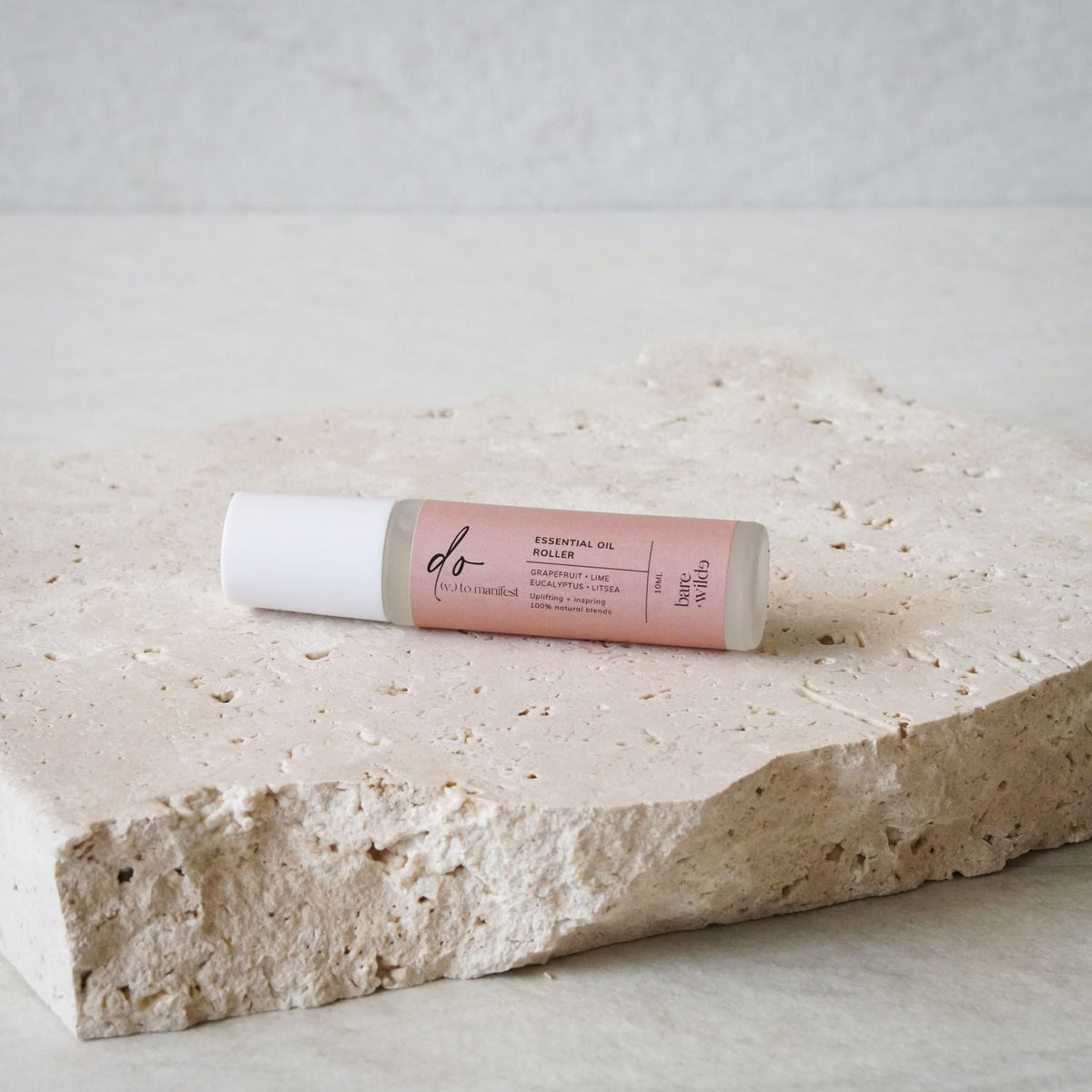 uplifting natural oil roller made with grapefruit, lime, eucalyptus and litsea essential oils