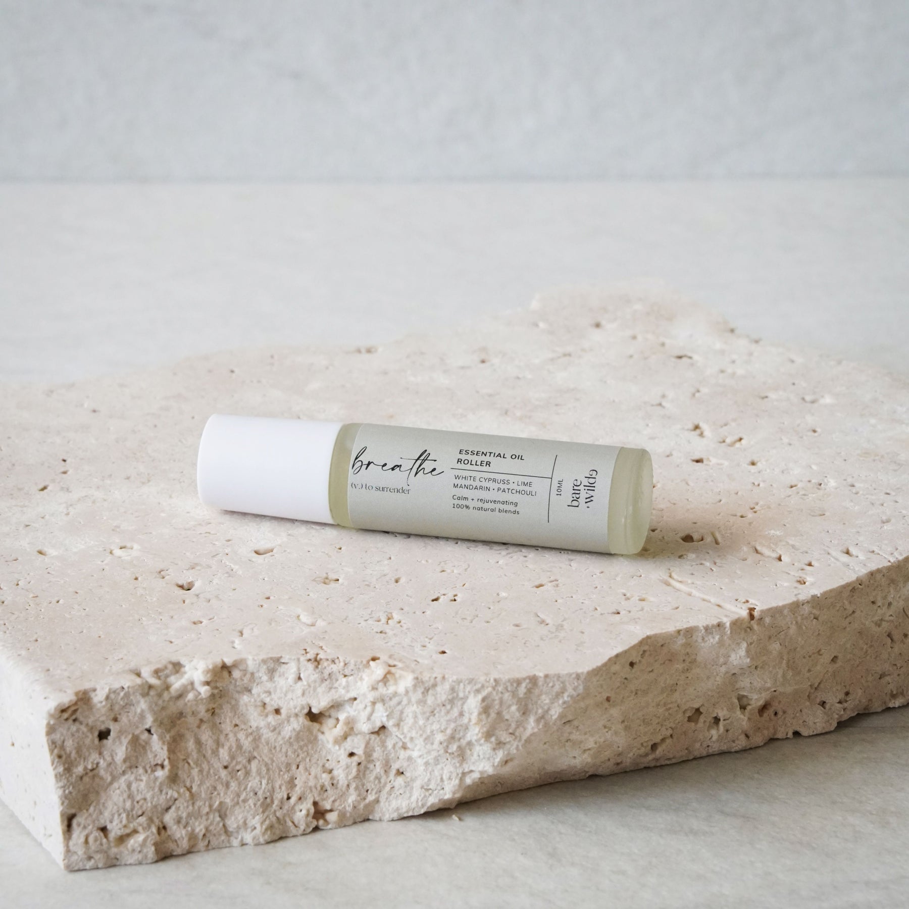 calming natural oil roller made with white cypress, lime, mandarin and patchouli essential oils